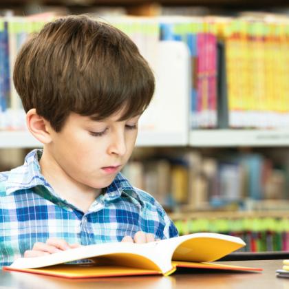A young learner reading a book